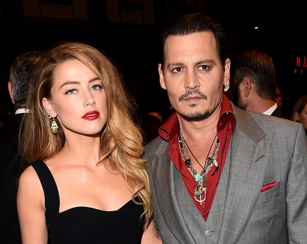 Johnny Depp e Amber Heard verso il divorzio Johnny Depp e Amber Heard verso il divorzio