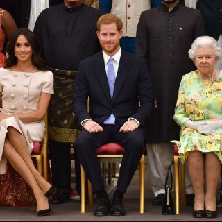 Pink look firmato Prada per Meghan Markle